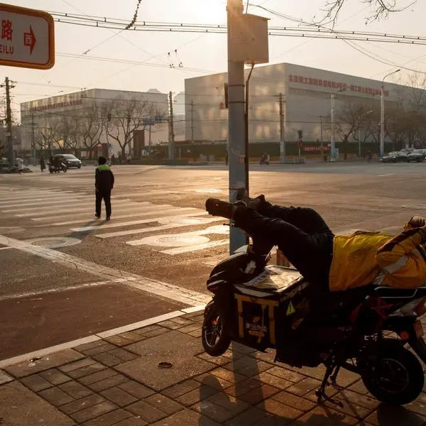 China's booming gig economy masks job market pain, strains welfare system