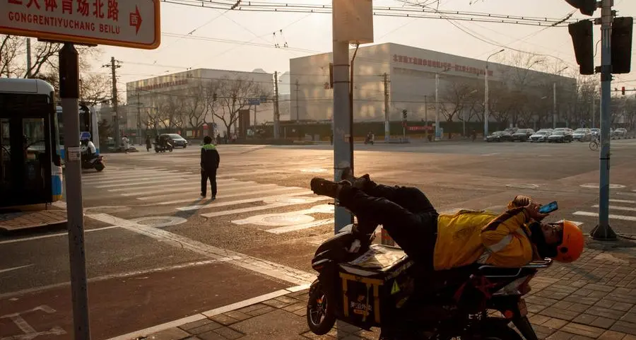 China's booming gig economy masks job market pain, strains welfare system