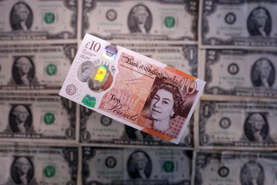 Sterling ticks higher as strong data, trade deal buffer against stronger dollar