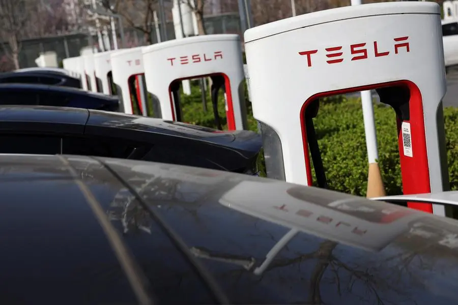 Tesla cars charge at a Supercharger charging station of the electric vehicle (EV) maker in Beijing, China March 24, 2025. REUTERS/Florence Lo , Reuters/REUTERS