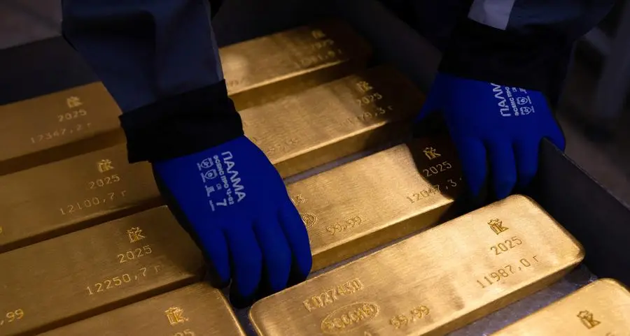 Gold poised for fourth weekly loss on hawkish Fed bets