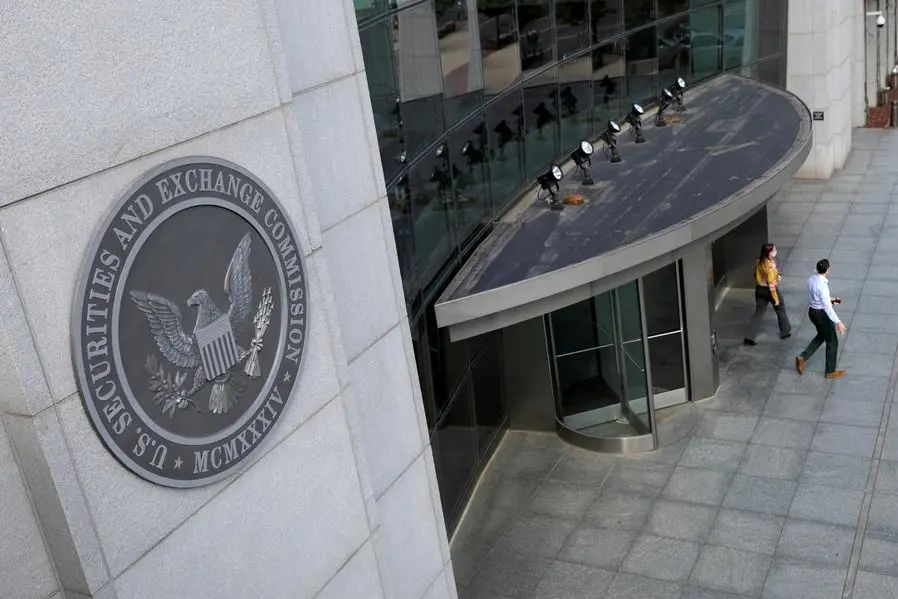 FILE PHOTO: People exit the headquarters of the U.S. Securities and Exchange Commission (SEC) in Washington, D.C., U.S., May 12, 2021. Picture taken May 12, 2021. REUTERS/Andrew Kelly. , Reuters