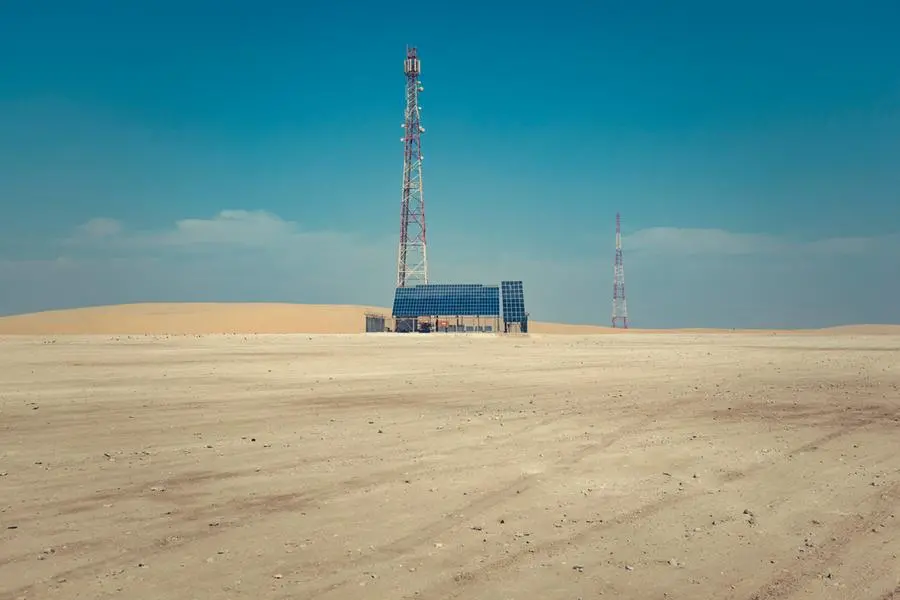 communication tower powered by solar energy in the desert of qatar, middle east. Image used for illustrative purpose. Image courtesy: Getty Images/ 35007 , Getty Images
