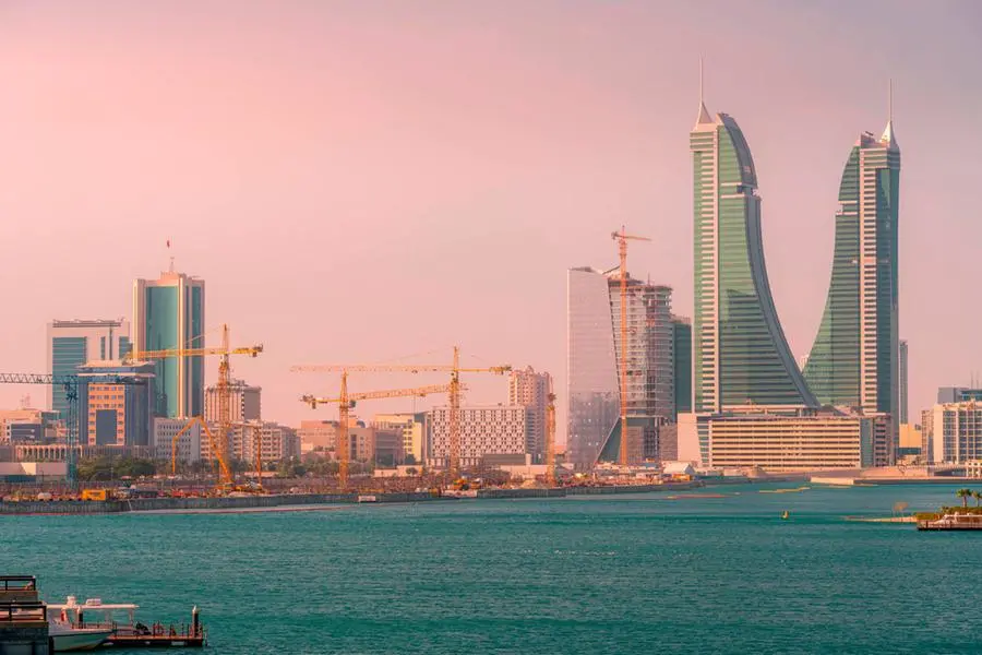 The view on Bahrain Financial Harbor, skyscrapers, and office buildings during the pink colorful sunset in Manama. Image used for illustrative purpose. Getty Images , Getty Images