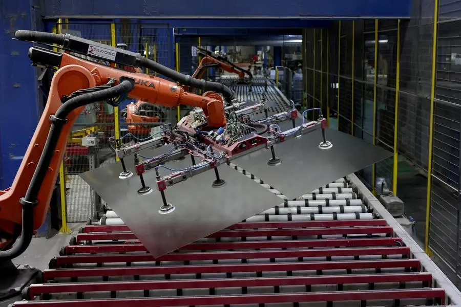 Robots shift solar glass at a production line of Borosil Renewables Ltd., a low-iron textured solar glass manufacturer, in Ankleshwar town in the western state of Gujarat, India, May 18, 2025. REUTERS/Amit Dave. , Reuters