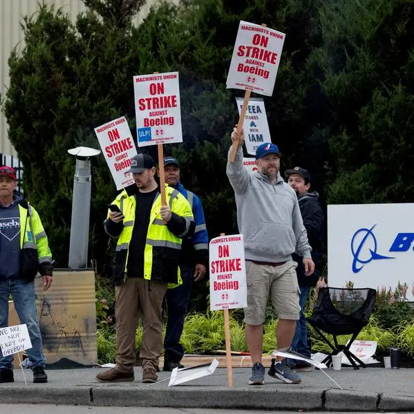 Boeing makes higher offer to striking workers, vote on Monday: union