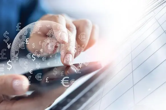 FinTech financial technology, Global business, online banking, interbank payment concept. Currency exchange, money transfer. Man using mobile phone, mobile banking with international currencies. Image used for illustrative purpose. Image courtesy: tippapatt/ Getty Images , Getty Images