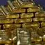 Gold falls as dollar strengthens ahead of key US inflation data