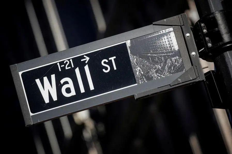 FILE PHOTO: A street sign for Wall Street is seen in the financial district in New York, U.S., November 8, 2021. REUTERS/Brendan McDermid. , Reuters