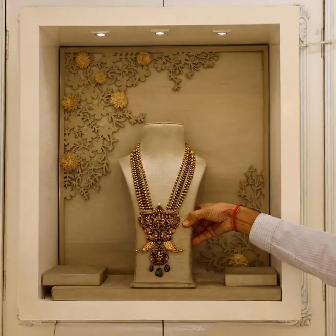 Gold prices retreat as traders lock in profits; US data in focus