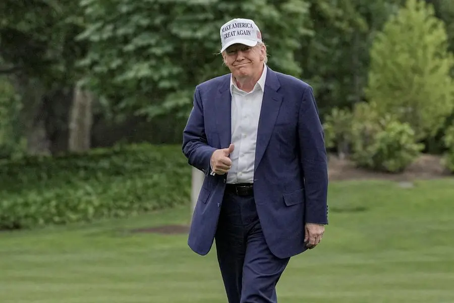U.S. President Donald Trump gives a thumbs up as he walks on the South Lawn of the White House in Washington, D.C., U.S., May 25, 2025. REUTERS/Ken Cedeno. Image used for illustrative purpose. , Reuters