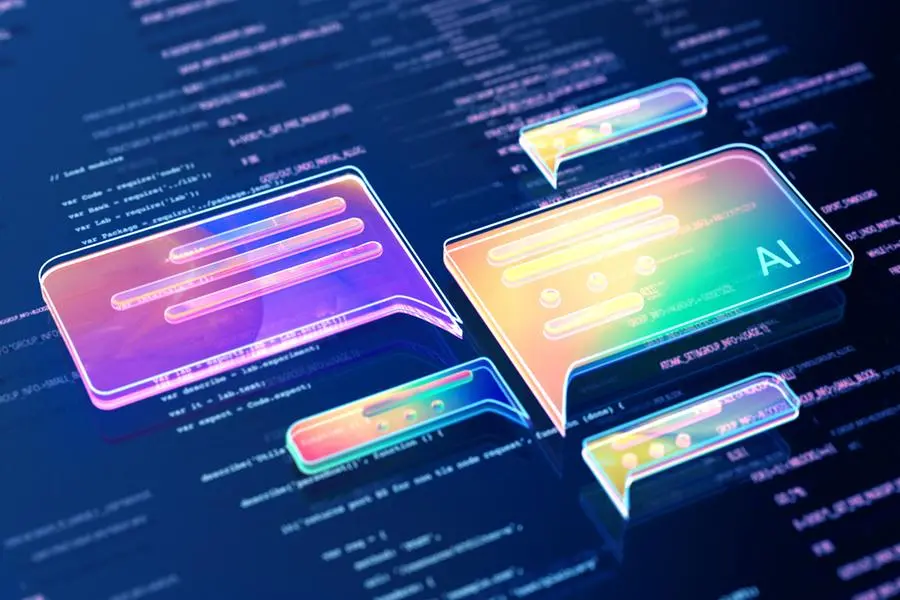 Digital generated image of abstract AI data chat icons flying over digital surface with codes. Image used for illustrative purpose. Image courtesy: Getty Images/ Andriy Onufriyenko , Getty Images