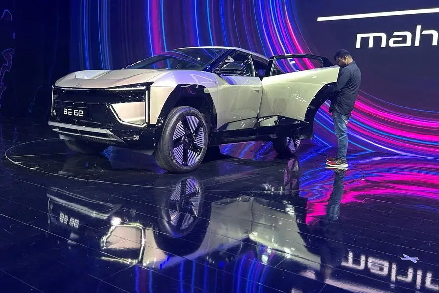 FILE PHOTO: A man films the interiors of newly launched Mahindra BE 6e, an electric SUV car, during its launch in Chennai, India, November 26, 2024. REUTERS/Nandan Mandayam. , Reuters
