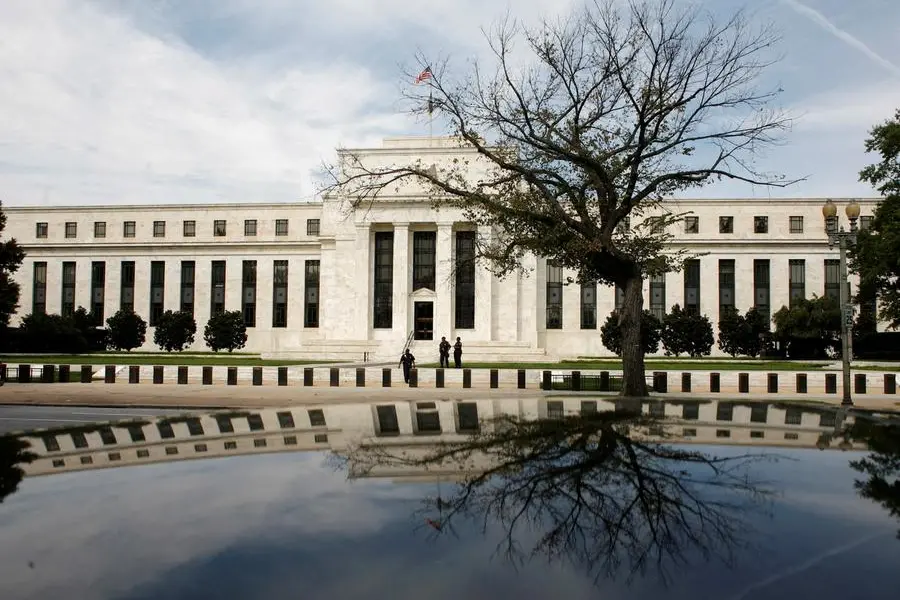 FILE PHOTO: The Federal Reserve building is reflected on a car in Washington September 16, 2008. REUTERS/Jim Young/File Photo , Reuters/REUTERS