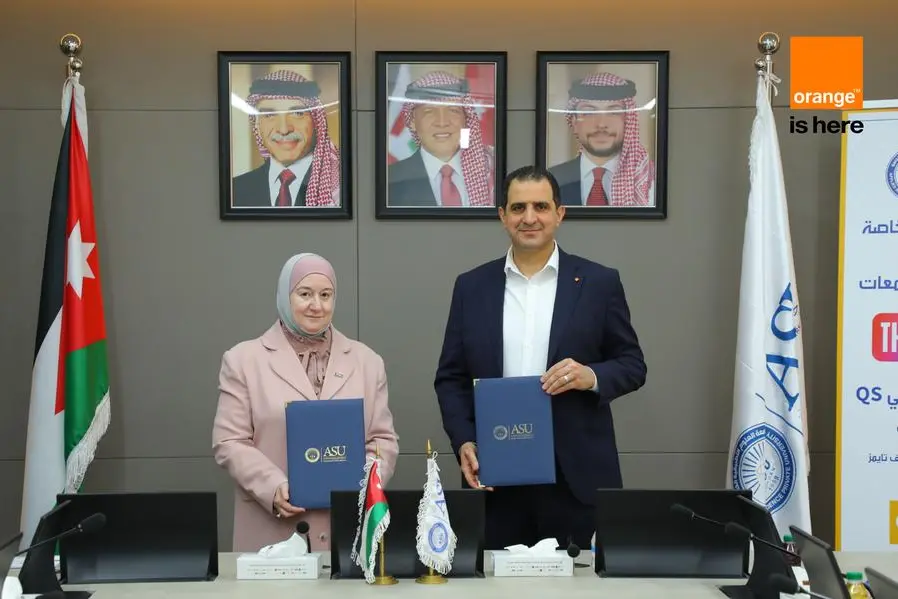 Orange Jordan has announced the signing of a partnership agreement with the Applied Science University to provide computers. Image Courtesy: Orange