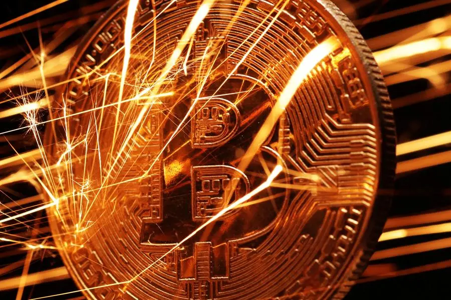 Sparks strike representation of cryptocurrency Bitcoin in this illustration taken November 24, 2024. REUTERS/Dado Ruvic/Illustration. , Reuters