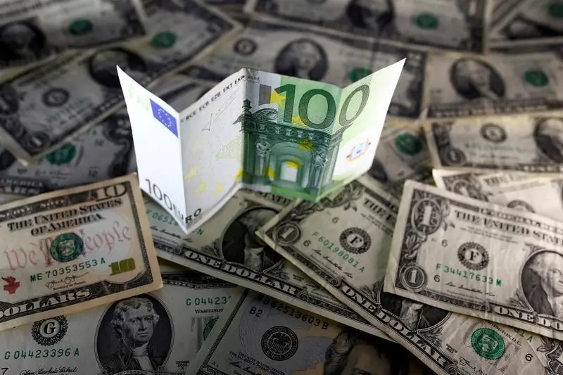 U.S. dollar and Euro notes are seen in this November 7, 2016 picture illustration. , Reuters Images/Dado Ruvic