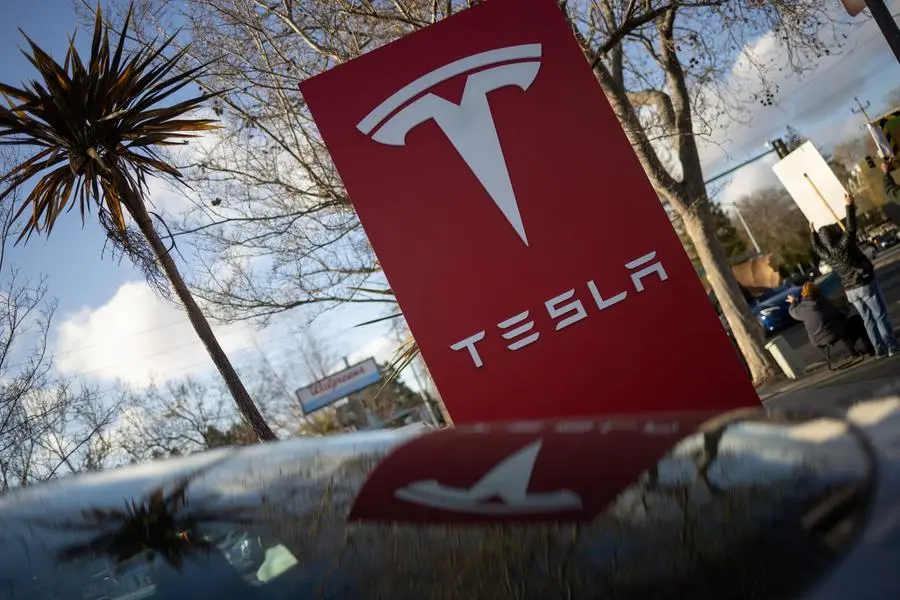 Residents protest against Elon Musk\\'s role at U.S. President Donald Trump\\'s administration, outside of a Tesla dealership in Palo Alto, California, U.S. March 5, 2025. REUTERS/Carlos Barria. , Reuters