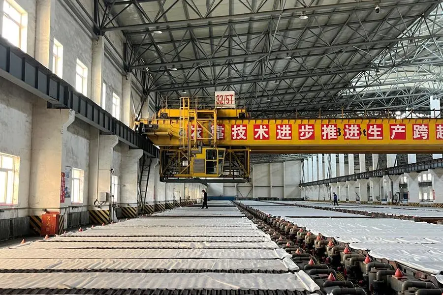 FILE PHOTO: Employees work at a copper smelter in Yantai, Shandong province, China April 26, 2023. REUTERS/Siyi Liu. , Reuters