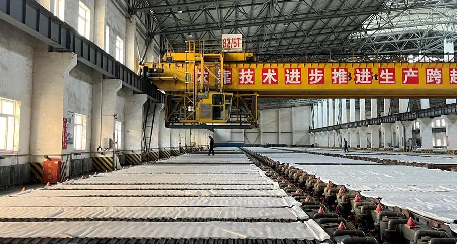 Shanghai copper hovers below record high as Chinese demand picks up, dollar weakens