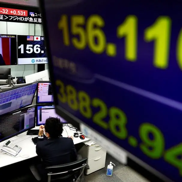 Asian stocks muted, yen calms as BOJ stands pat on rates