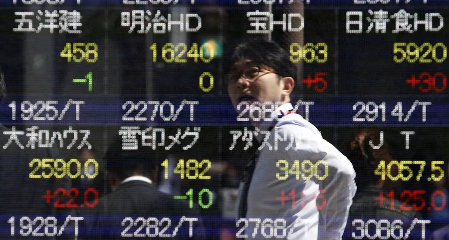 Asia stocks rally with Wall Street, Japan raises rates