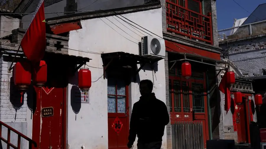 As parliament meets, China is yet to pass last year's economic reform test