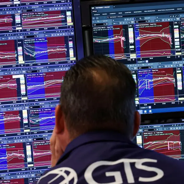 Stocks and dollar slip as investors await Trump's tax bill