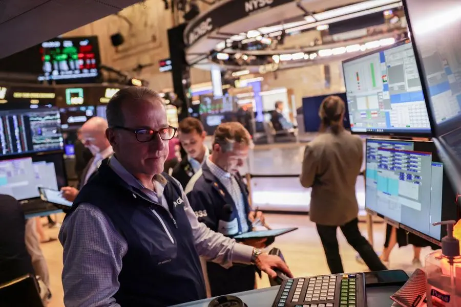 Traders work on the floor at the New York Stock Exchange (NYSE) in New York City, U.S., May 30, 2025. REUTERS/Jeenah Moon. , Reuters