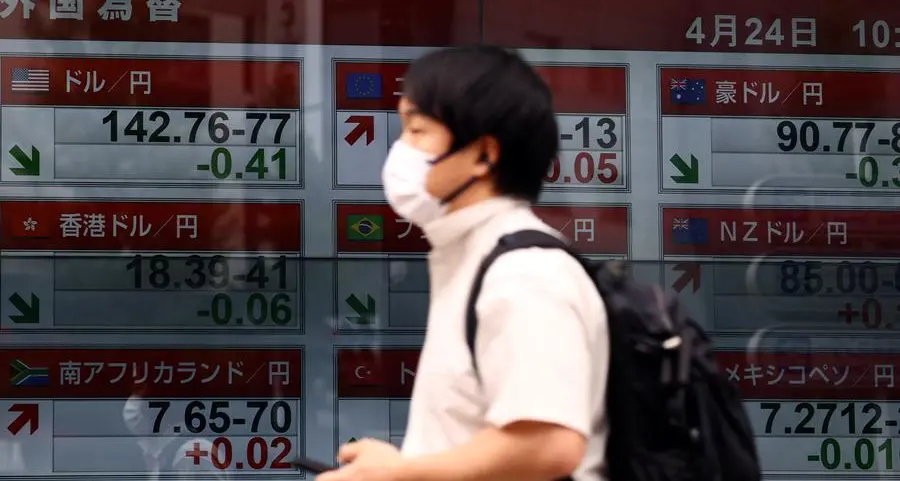 World stocks pause as markets eye US-China talks, Fed rate decision