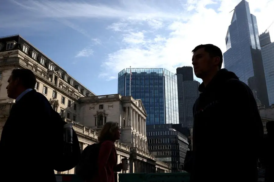 FILE PHOTO: People walk outside the Bank of England in the City of London financial district in London, Britain May 11, 2023. REUTERS/Henry Nicholls/File Photo , Reuters/REUTERS