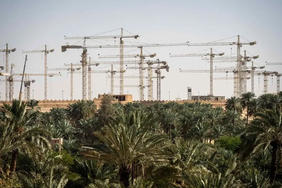Tower cranes at construction site Renovation program, development, concept of the buildings industry. Ad Diriyah, At-Turaif District, Riyadh, Saudi Arabia. Image used for illustrative purpose. Image courtesy: paul biris/ Getty Images , Getty Images