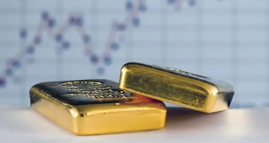 Gold gains as dollar slips, investors await US-China trade talks