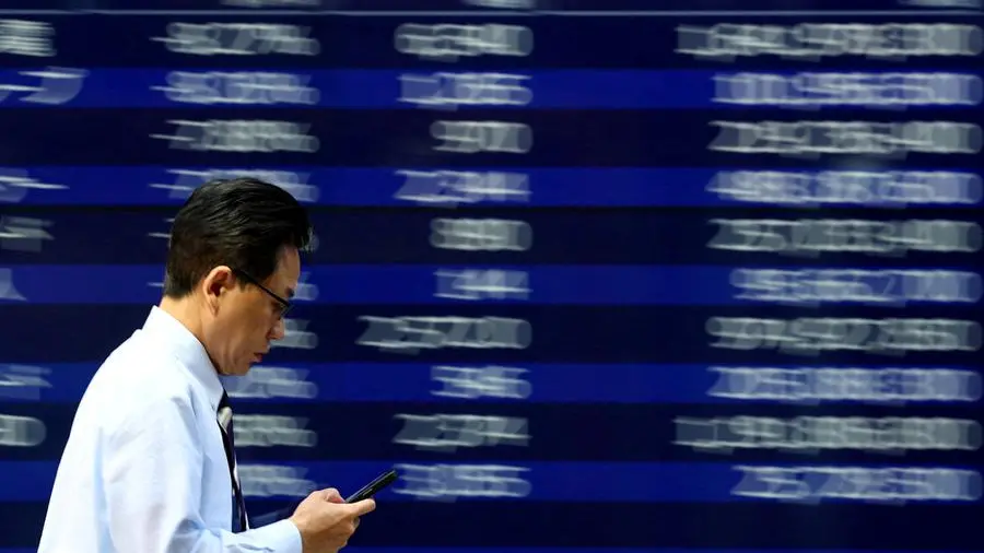 Asian shares track Wall Street higher, yen weak ahead of Japan vote
