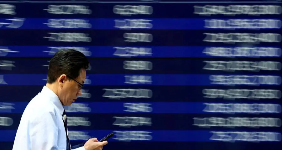 Asia stocks power towards weekly gain, oil below $100 on peace deal hopes