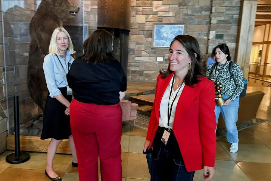 FILE PHOTO: Beth Hammack, who started her job as president of the Federal Reserve Bank of Cleveland on August 21, 2024, heads into the Kansas City Fed\\'s annual economic symposium in Jackson Hole, Wyoming, U.S., August 22, 2024. REUTERS/Ann Saphir. , Reuters