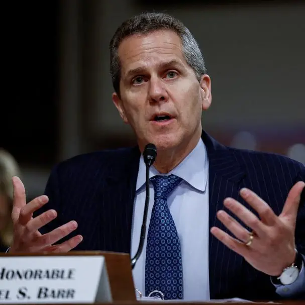 Fed's Barr sees rates holding steady 'for some time' given above-target inflation