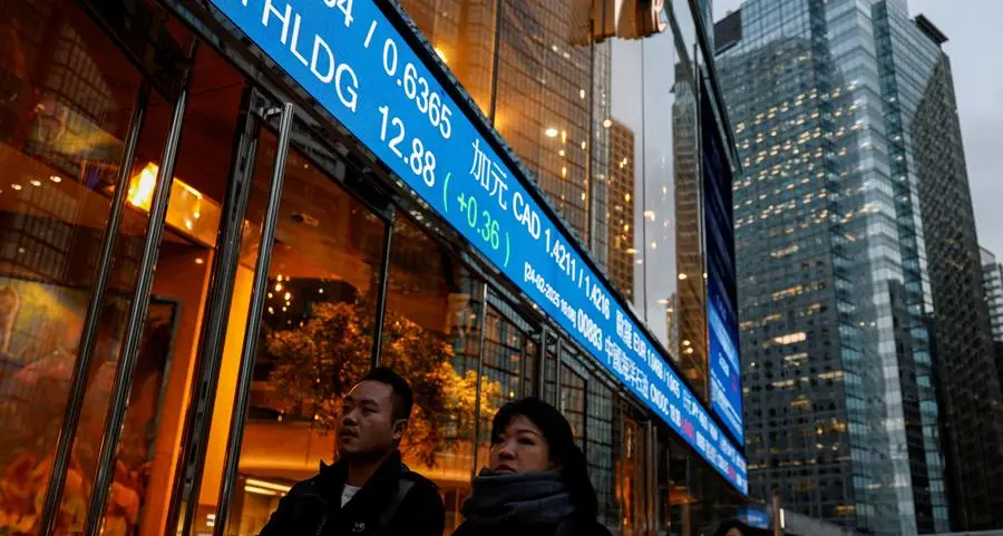 Oracle knocks stocks as Fed's message weighs on dollar