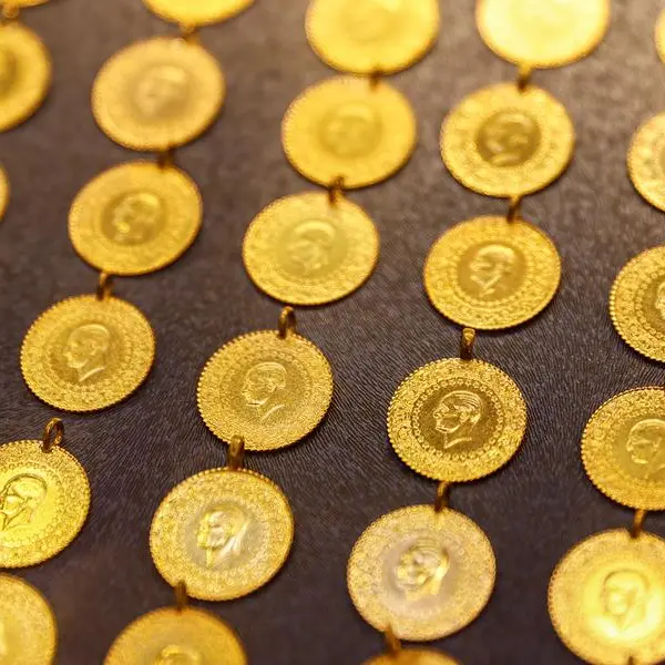 Gold rises as investors seek safety amid US policy jitters