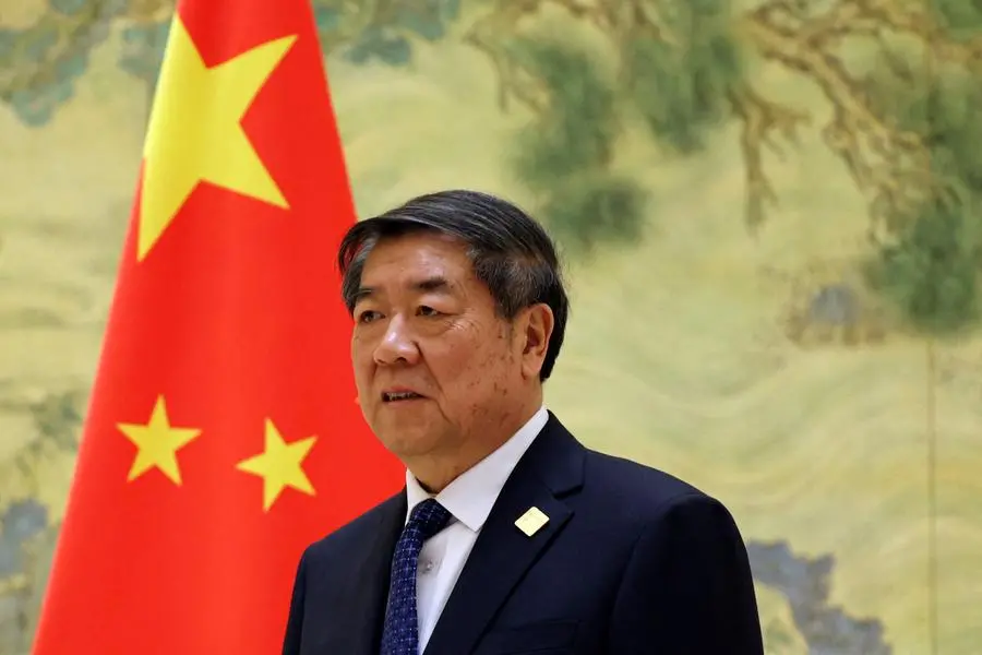 FILE PHOTO: Chinese Vice Premier He Lifeng waits for a photo session with Britain\\'s Chancellor of the Exchequer Rachel Reeves (not pictured) before the China-UK Financial Services Summit, at the Diaoyutai State Guesthouse in Beijing, China January 11, 2025. REUTERS/Florence Lo. , Reuters