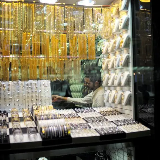 Gold gains as 'dollar negative' sentiments take hold