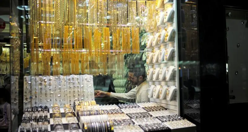 Gold gains as 'dollar negative' sentiments take hold