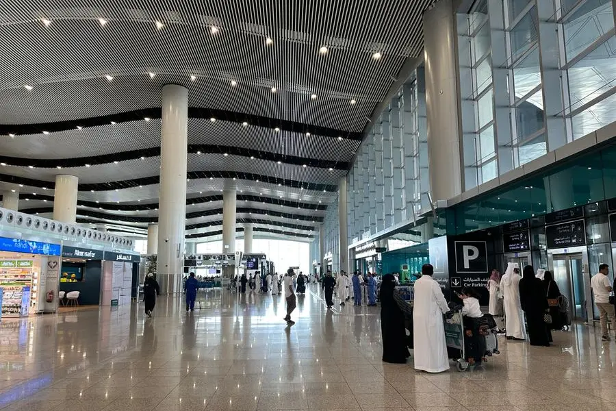 Riyadh , Saudi Arabia - Mar 11 2023 : Passengers traveling through King Khalid International Airport Riyadh Airport - flight and booking concept. Image used for illustrative purpose. Getty Images , Getty Images