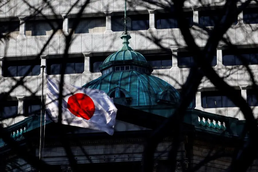 Japanese national flag hoisted atop of the Bank of Japan headquarters is seen through trees in Tokyo, Japan January 23, 2025. REUTERS/Issei Kato. , Reuters