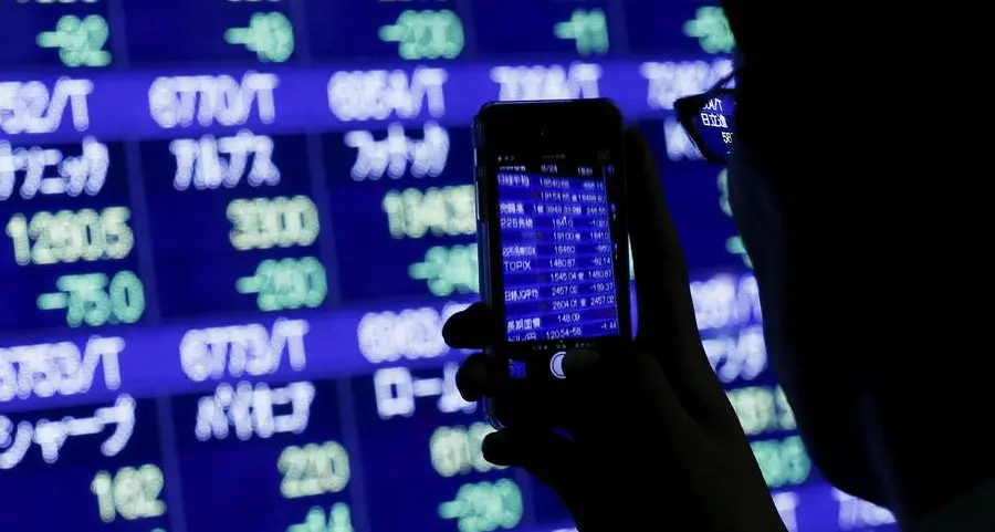 Stocks fall and oil rises after Iran leader's uranium demand