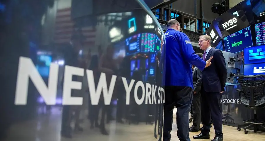 US Stocks: Indexes end near flat, supported by Fed hopes but dragged by Amazon