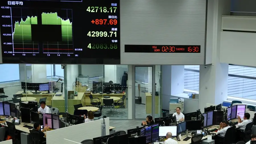 Asia upbeat on Wall Street boost as markets await US inflation data