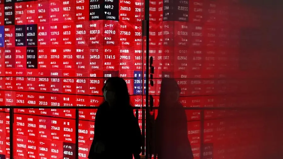 Asian shares rise, dollar strengthens ahead of US earnings; JGB yields surge
