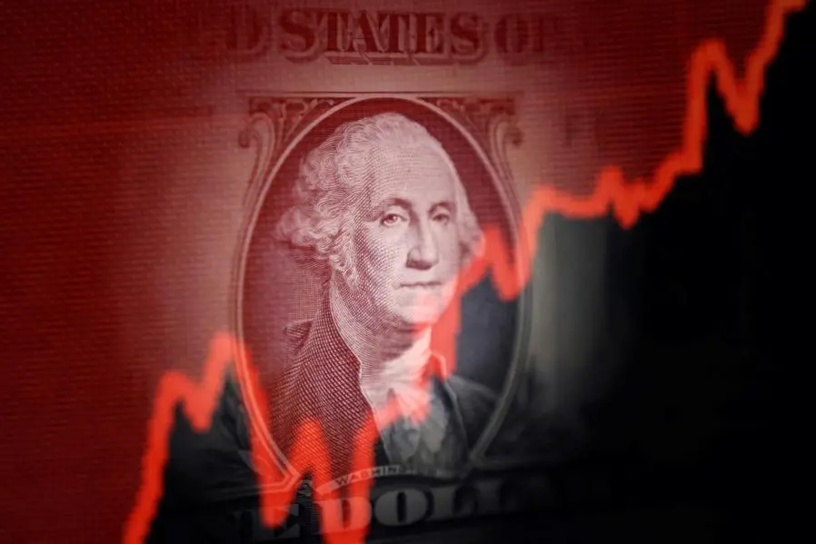 U.S. dollar banknote and rising stock graph are seen in this illustration taken April 25, 2025. REUTERS/Dado Ruvic/Illustration. , Reuters