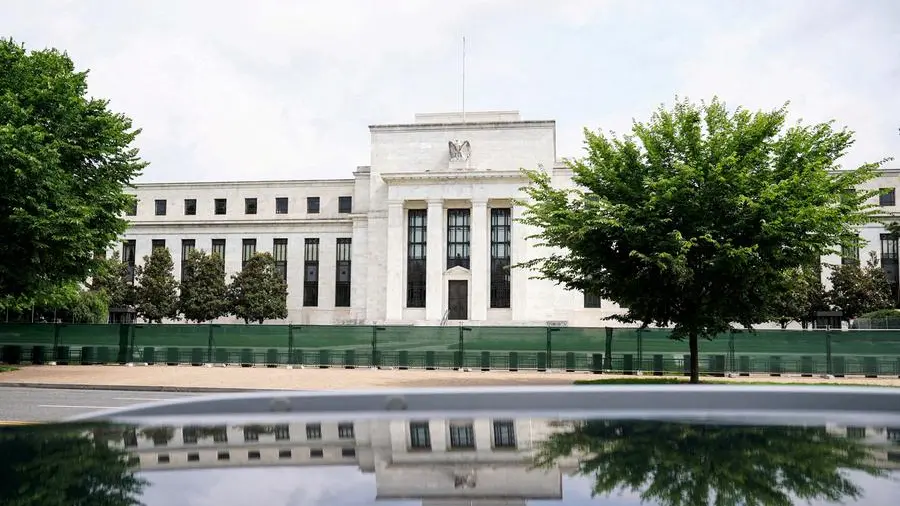 Euro set for first monthly decline this year, focus switches to Fed